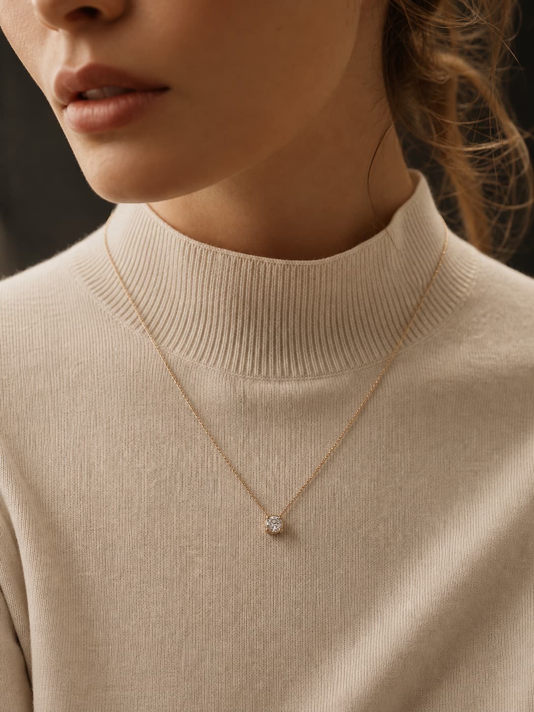 Natural diamond pendant worn by a model, editorial portrait